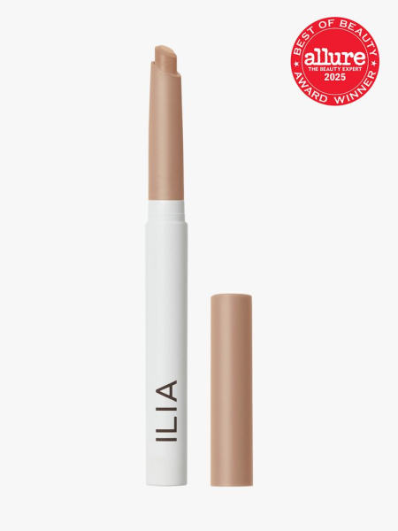 ILIA Beauty Eye Stylus Shadow Stick in branded twist up crayon applicator next to cap on light gray background with red Allure Best of Beauty seal in the top right corner