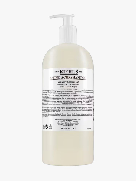 Kiehl’s Amino Acid Shampoo in branded component on a light gray background